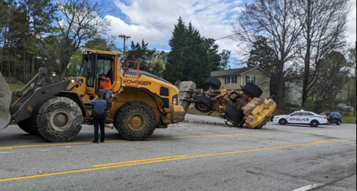 The chase was in its fifth mile when the pursuing front-end loader managed to get its bucket in a good position and flip the stolen vehicle, video shows.