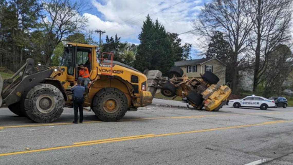 The chase was in its fifth mile when the pursuing front-end loader managed to get its bucket in a good position and flip the stolen vehicle, video shows.