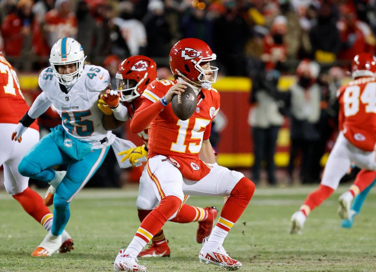 Kansas City Chiefs quarterback Patrick Mahomes (15) looks to pass during first half of an NFL wild-card playoff football game against the Miami Dolphins at GEHA Field at Arrowhead Stadium in Kansas City, Missouri, on Saturday, January 13, 2024.