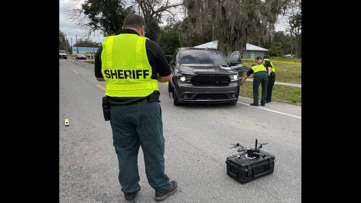 A 15-year-old on an electric scooted collided with the front of an SUV when the vehicle swerved into the oncoming lane to avoid hitting dogs in the road, Florida police said.