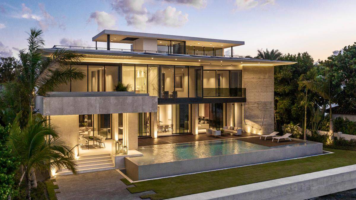 The three-story home at 941 N. Venetian Drive sold on Monday for $13.6 million. Above: A photo of the waterfront home designed by the Miami Beach architecture firm Thirlwall.