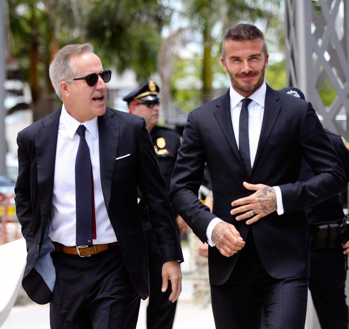 Jorge Mas and David Beckham arrive at rally next to Miami City Hall where they will the address the Miami City Commission on behalf of MLS stadium plans in Miami on Thursday, July 12, 2018.
