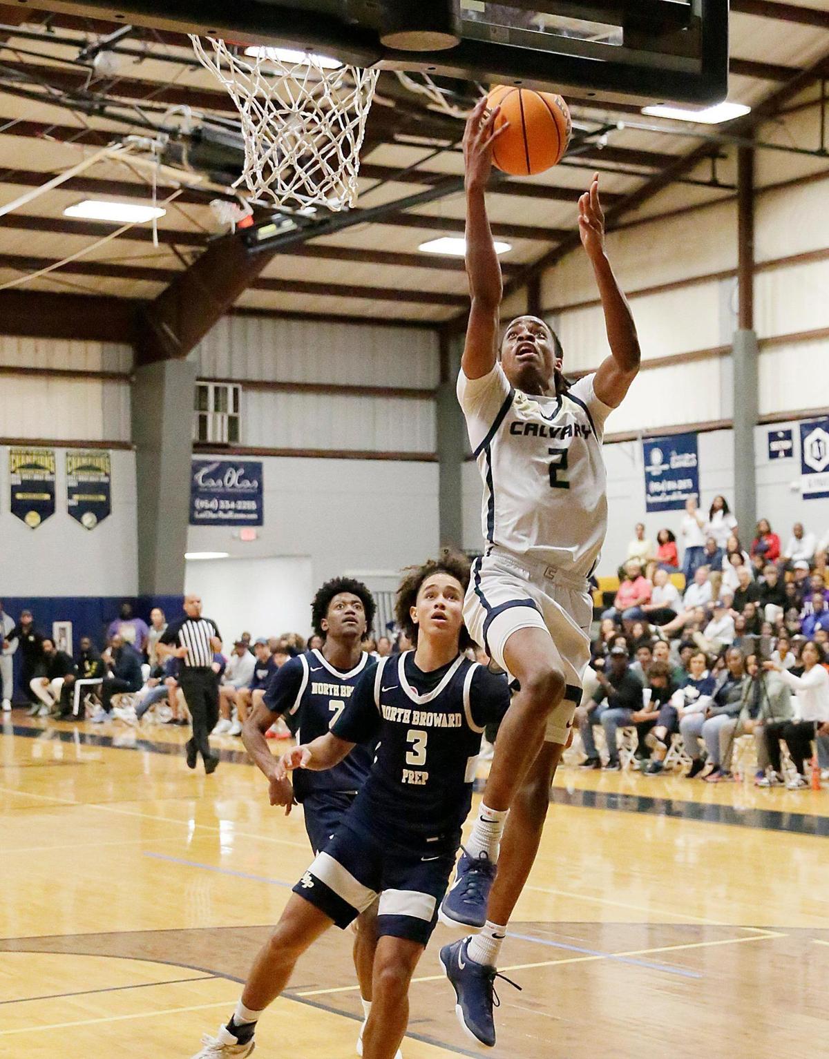 Calvary Christian Kenneth Francis Jr. (2) goes for a shot against North Broward during regional basketball semifinal playoff game on Monday, February 17, 2025 at Calvary Christian School in Fort Lauderdake. Andrew Uloza / for Miami Herald