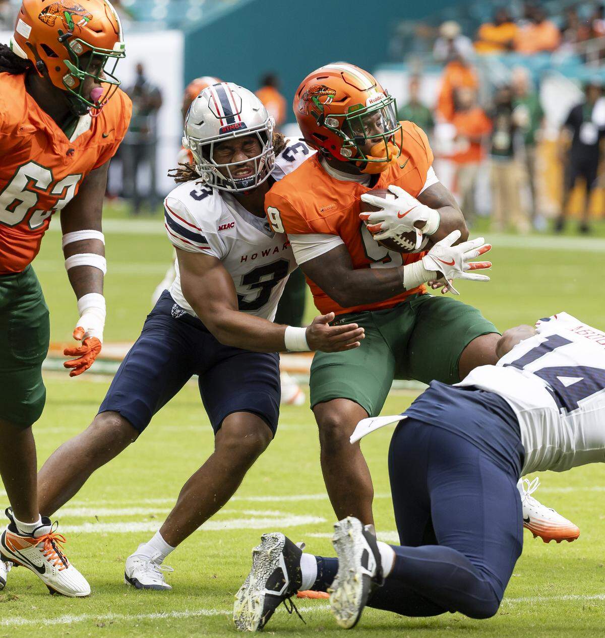 Howard Bison linebacker Judah McJimpsey (3) tackles Florida A&M Rattlers running back Levontai Summersett (9) in the first half of their Orange Blossom Classic football game at Hard Rock Stadium on Saturday, Aug. 30, 2025, in Miami Gardens, Fla.