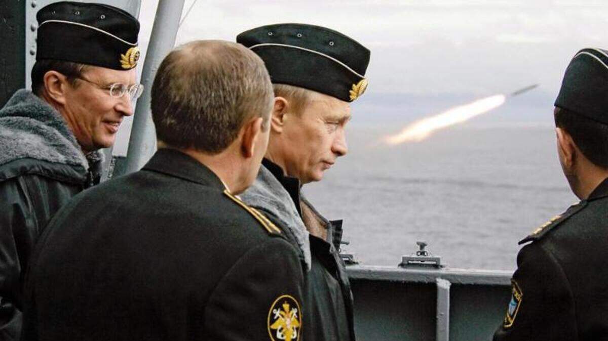 In 2005, Russian President Vladimir Putin, center,  watched missile launch during military exercises in the Barents Sea aboard a nuclear missile cruiser.