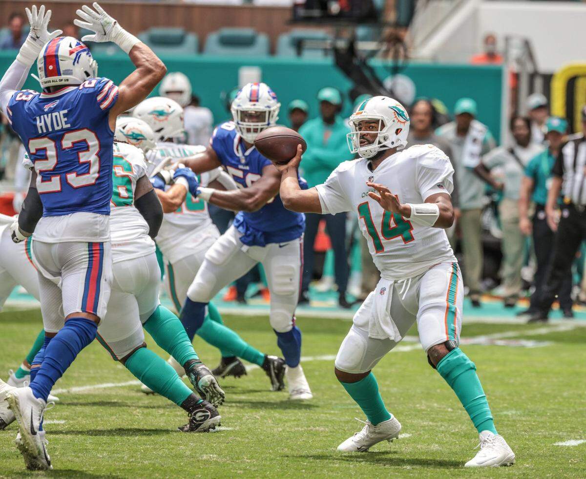Miami Dolphins quarterback Jacoby Brissett (14) passes the ball in the first half during game against the Buffalo Bills in Miami Gardens on Sunday, September 19, 2021.