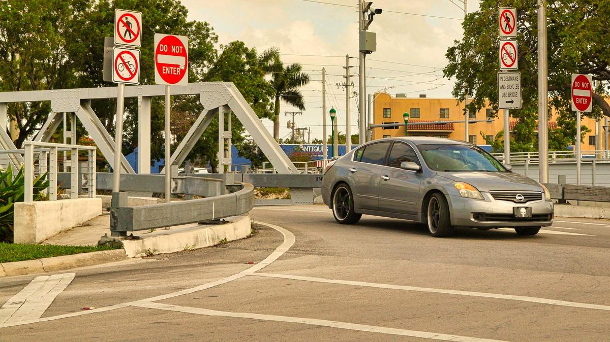 A camera above Miami Springs’ entrance bridge, from Hialeah, allows police to run tags on vehicles as they enter Curtiss Pkwy.