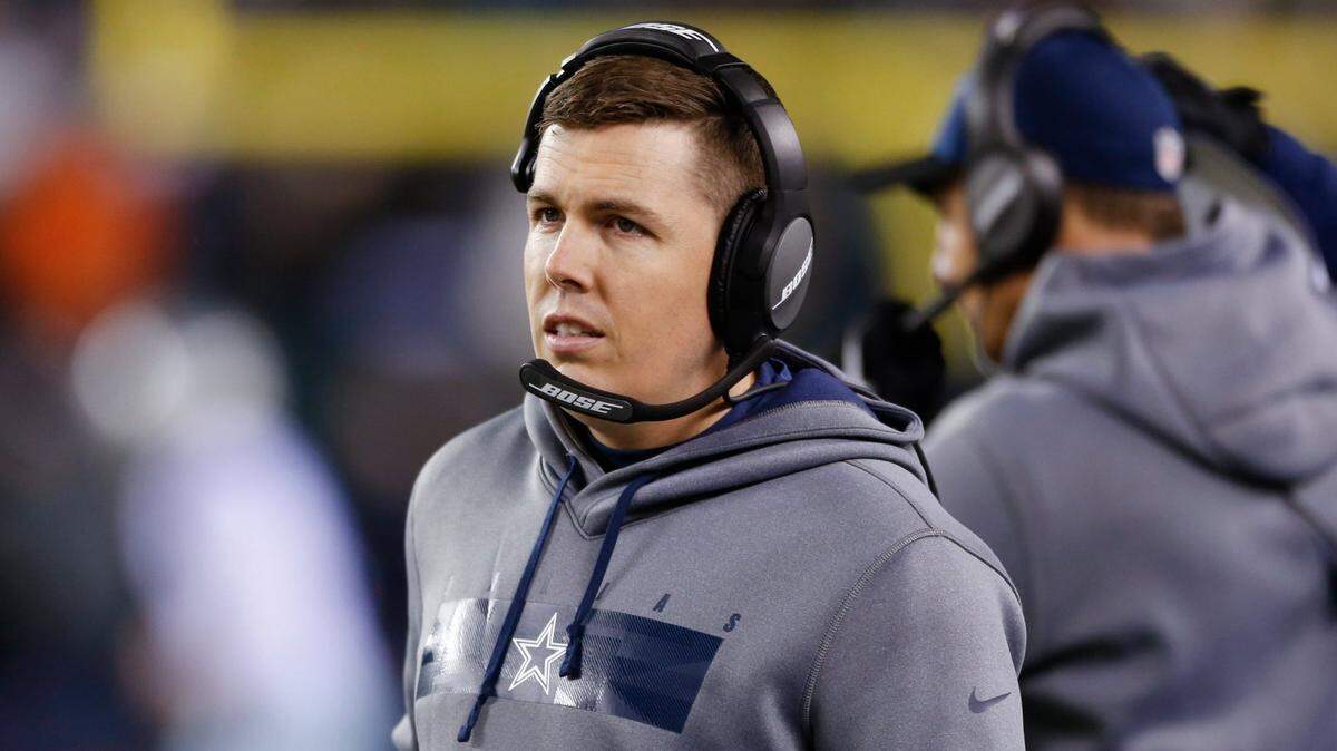Dallas Cowboys offensive coordinator Kellen Moore before an NFL football game against the Philadelphia Eagles, Saturday, Jan. 8, 2022, in Philadelphia. (AP Photo/Laurence Kesterson)