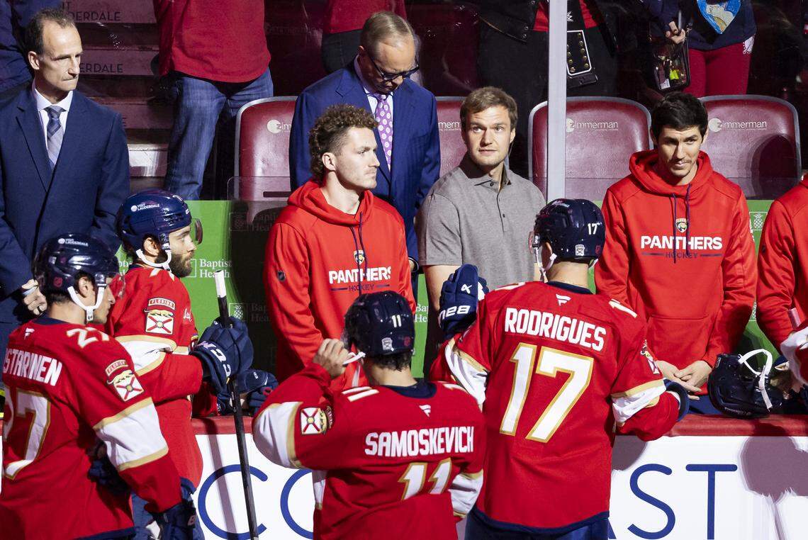 Florida Panthers center Aleksander Barkov (16) and Matthew Tkachuk (19) attend banner ceremony before their NHL home opener against the Chicago Blackhawks at the Amerant Bank Arena on Oct. 7, 2025 in Sunrise, Fla.