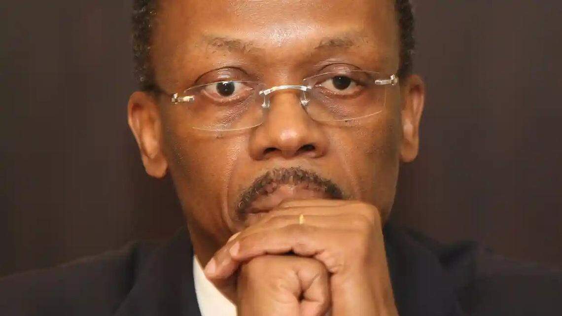 Former U.S. ambassador disputes French assertion that the United States tried to oust former Haitian President Jean-Bertrand Aristide.