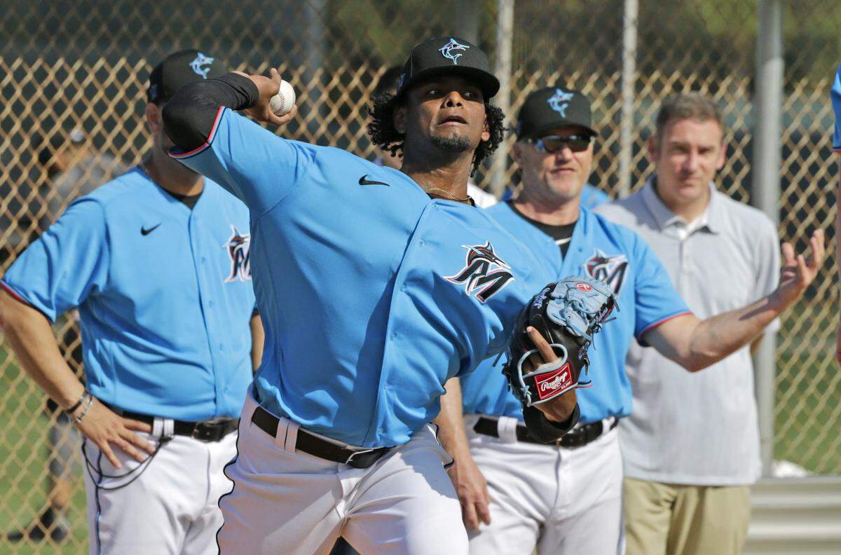 Miami Marlins pitcher Edward Cabrera (73) throws during the first full-squad spring training workout at Roger Dean Stadium on Monday, February 17, 2020 in Jupiter, FL.