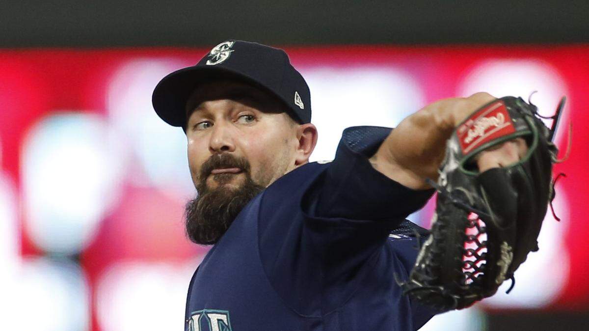 Seattle Mariners relief pitcher Nick Vincent throws against the Minnesota Twins in the eighth inning of a baseball game Wednesday, June 14, 2017, in Minneapolis. (AP Photo/Jim Mone)