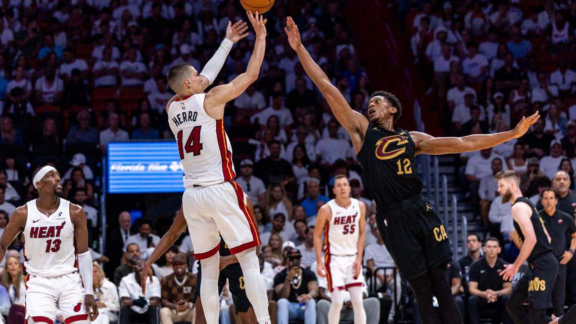 Miami Heat guard Tyler Herro (14) shoots over Cleveland Cavaliers forward De’Andre Hunter (12) during the second half of Game 3 of the NBA Playoffs at Kaseya Center on Saturday, April 26, 2025, in Miami, Fla.