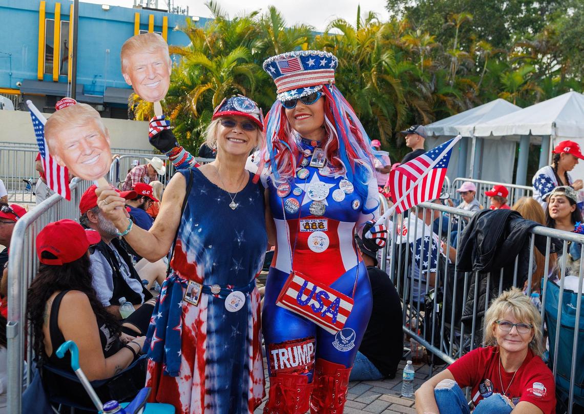 Former President Donald Trump supporters Kim Stevenson (left) of San Antonio and Micki Larson-Olsen, of Abilene, Texas, lined up early morning for his late night appearance at the Ted Hendricks Stadium at Henry Milander Park in Hialeah, on Wednesday, November 08, 2023.