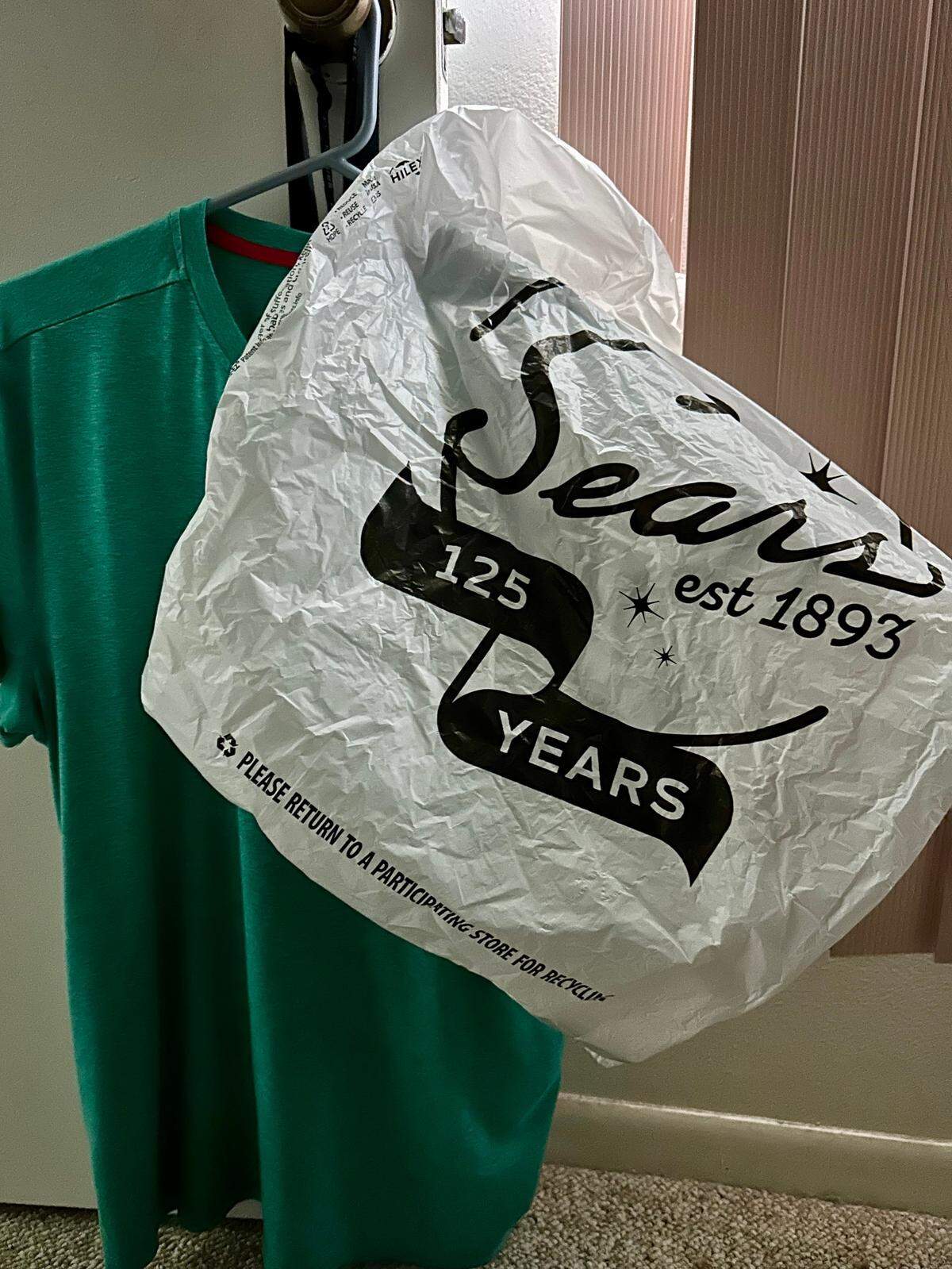 The plastic Sears bag a store clerk at the Miami store gave a customer on July 10, 2024, was emblazoned with a “125th anniversary” celebration design — “est. 1893.” But 125 years after establishing Sears would mark this bag as originating in 2018.
