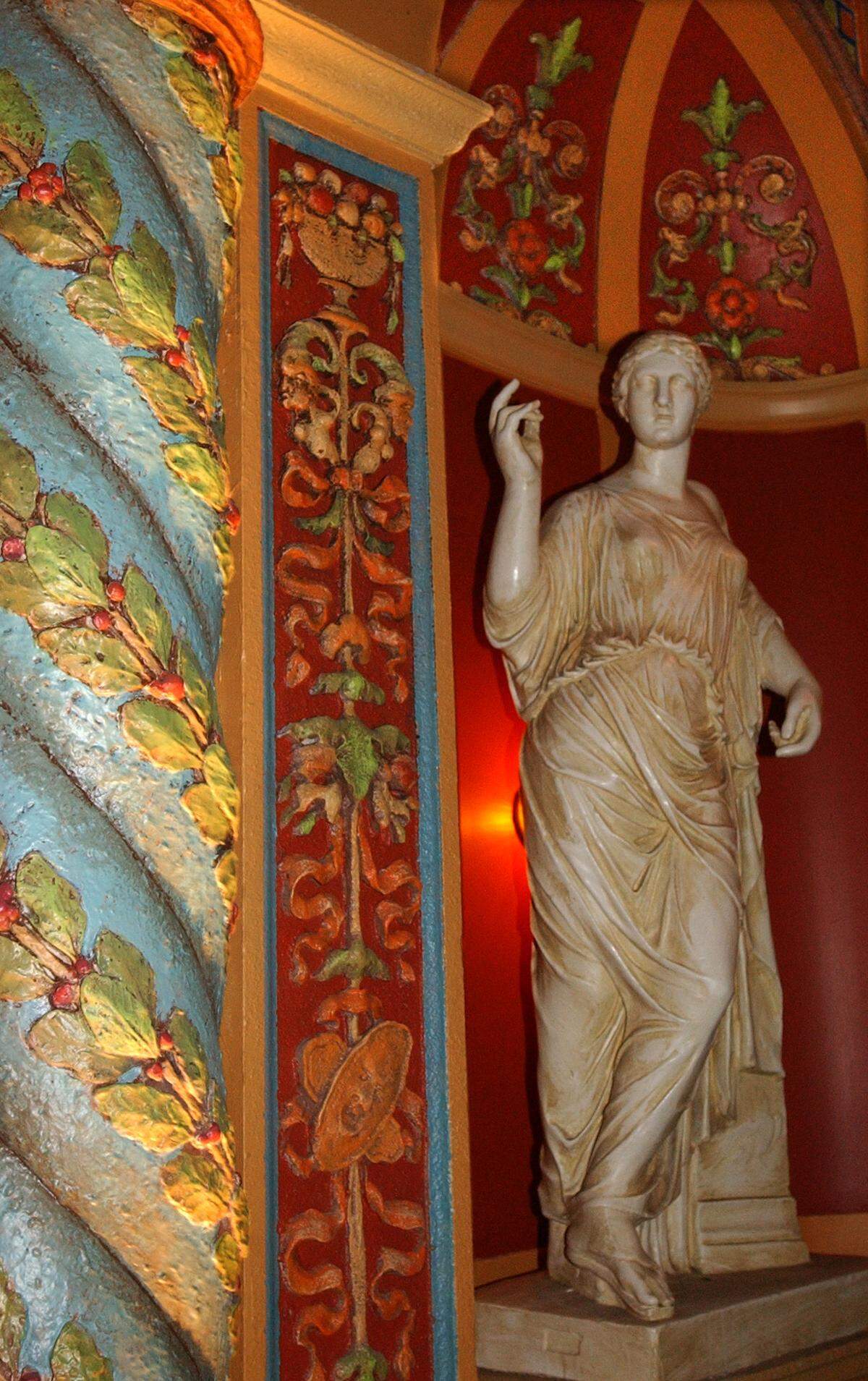 Statues and elaborate details, seen here following a 2002 restoration, adorn the auditorium at the historic Olympia Theater in downtown Miami.