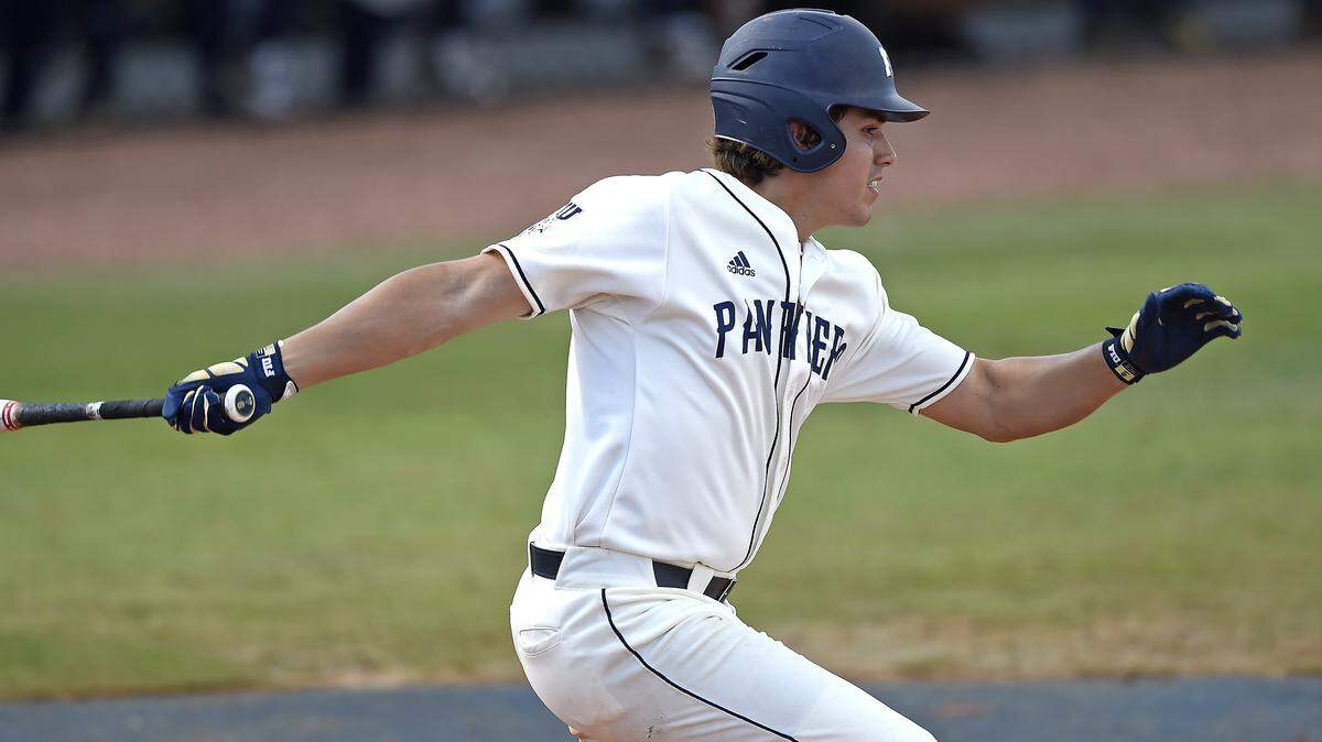 FIU third baseman Austin Shenton (6) bats in the seventh inning as the FIU Golden Panthers defeated the University of Missouri Tigers, 11-5, on February 18, 2017, at University Park Stadium in Miami, Florida.