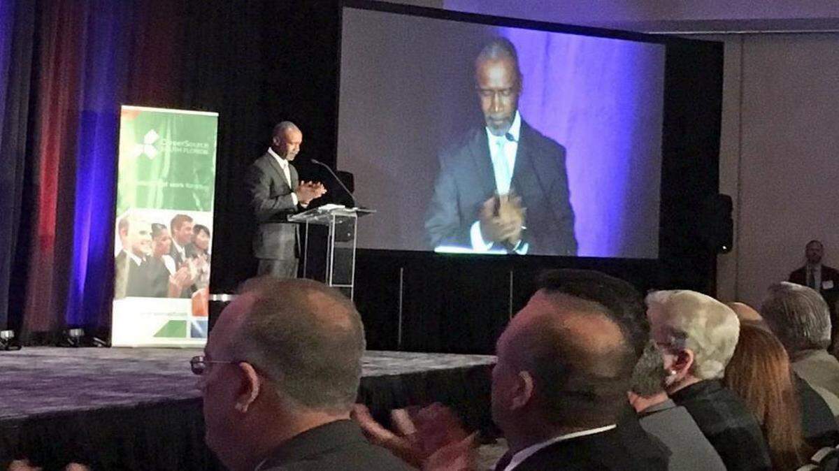Mike Finney, president and CEO of the Beacon Council, presents at the One Community, One Goal ceremony in 2017.