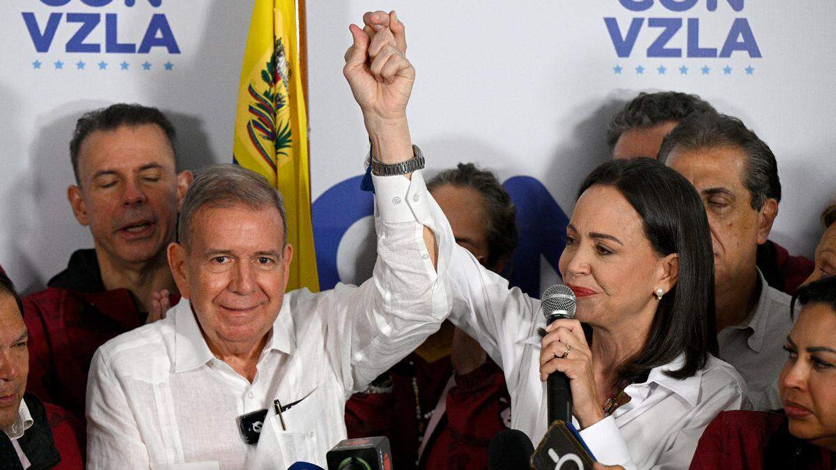 Venezuelan opposition leader Maria Corina Machado talks to the media, accompanied by opposition presidential candidate Edmundo Gonzalez Urrutia, following the presidential election results in Caracas on July 29, 2024. Venezuela’s opposition coalition on Monday rejected the election victory claimed by President Nicolas Maduro and announced by a loyalist electoral authority, saying it had garnered 70 percent of the vote, not 44 percent as reported by the authority. (Photo by Federico PARRA / AFP) (Photo by FEDERICO PARRA/AFP via Getty Images)