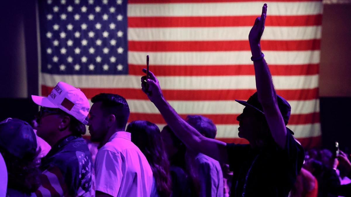 Attendees reacts as contemporary gospel music is performed during the Turning Point Action Believers Summit at the Palm Beach County Convention Center on Friday, July 26, 2024.