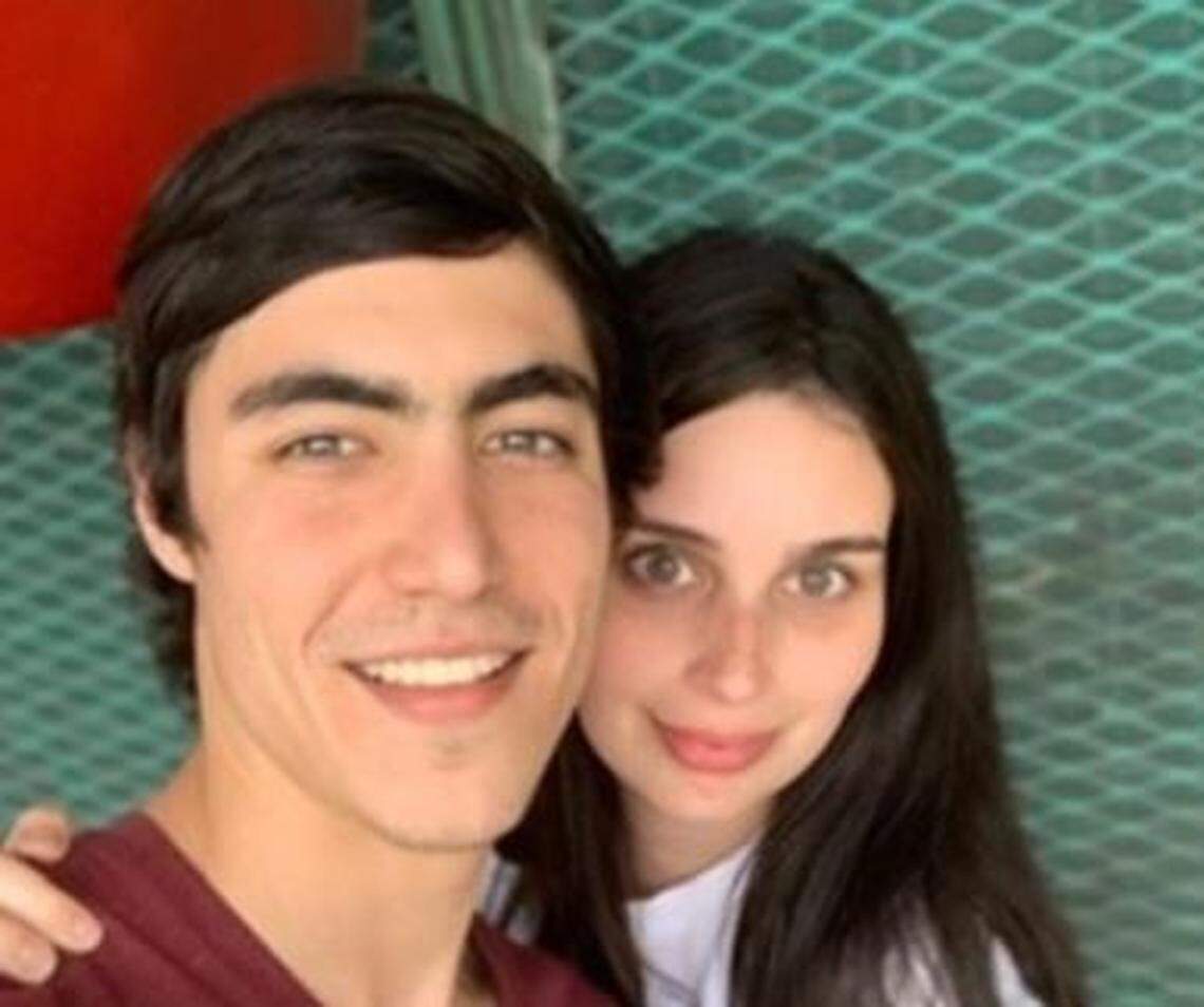 Moises Rodan, pictured with a friend who was not in the building, recently graduated from the University of Florida.