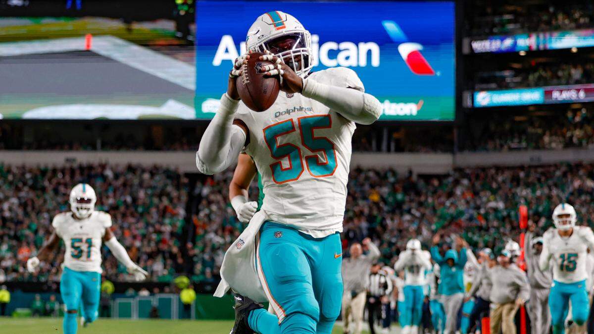 Miami Dolphins linebacker Jerome Baker (55) scores on an interception against the Philadelphia Eagles in the second half at Lincoln Financial Field, Philadelphia, PA on Sunday, October 22, 2023.