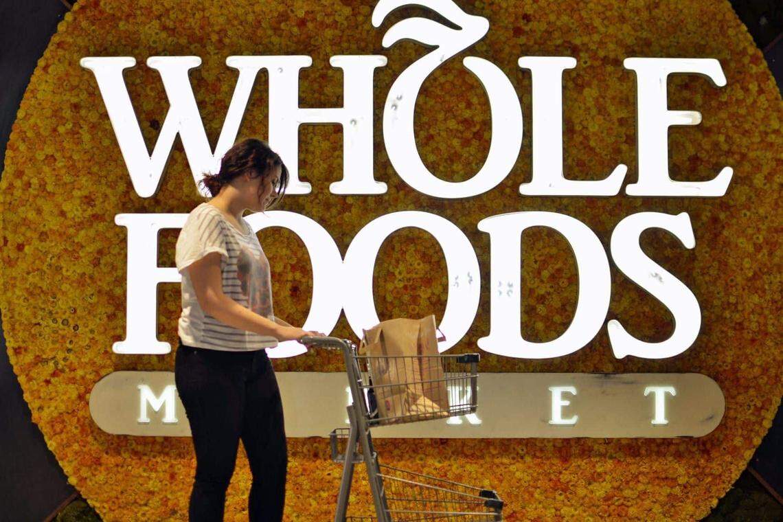 Whole Foods Market logo.