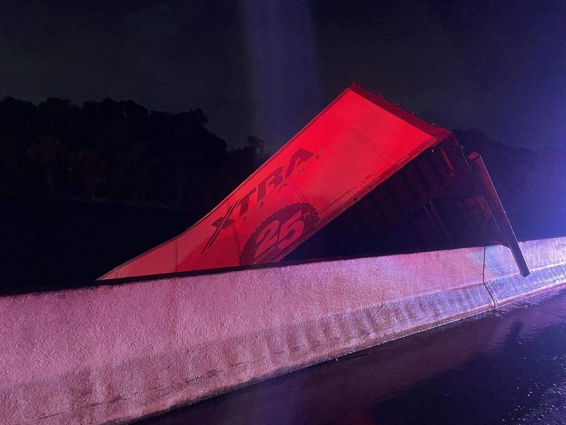 Hillsborough County Fire Rescue reports it arrived to find “the truck mostly over the guard rail, with the front cab still out of the water.” It sank not long after, officials said.