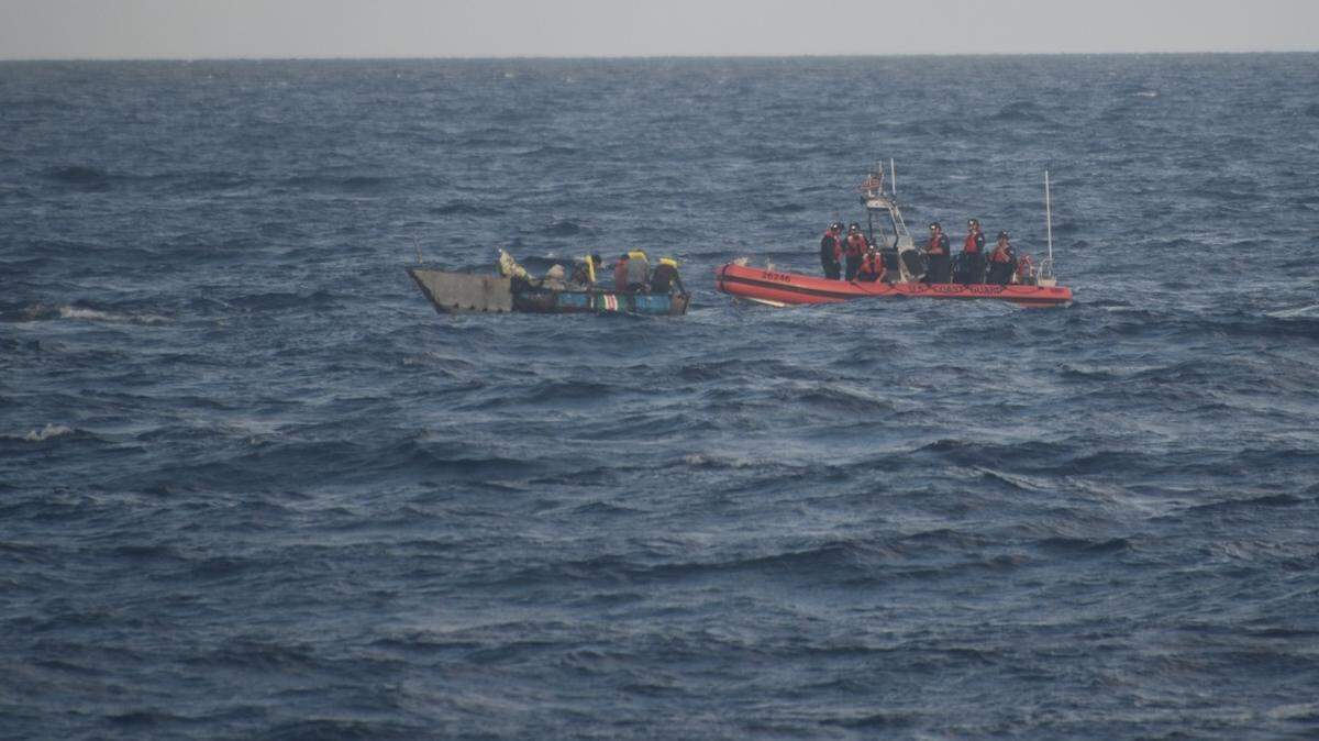 A Coast Guard Cutter Charles Sexton small boat crew interdicts a Cuban migrant vessel 25 miles southeast of Tavernier Creek, Florida Thursday, Jan. 2, 2020.