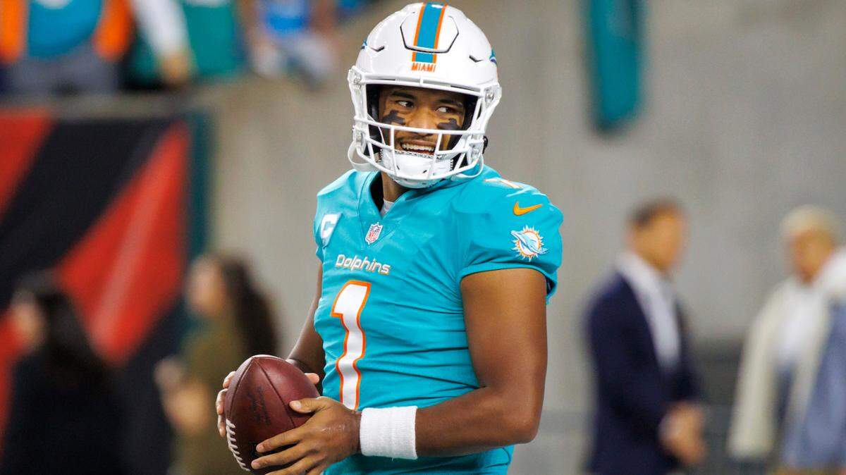 Miami Dolphins quarterback Tua Tagovailoa laughing during pregame warmups before the start of an NFL football game at Paycor Stadium on Thursday, September 29, 2022 in Cincinnati, Ohio.