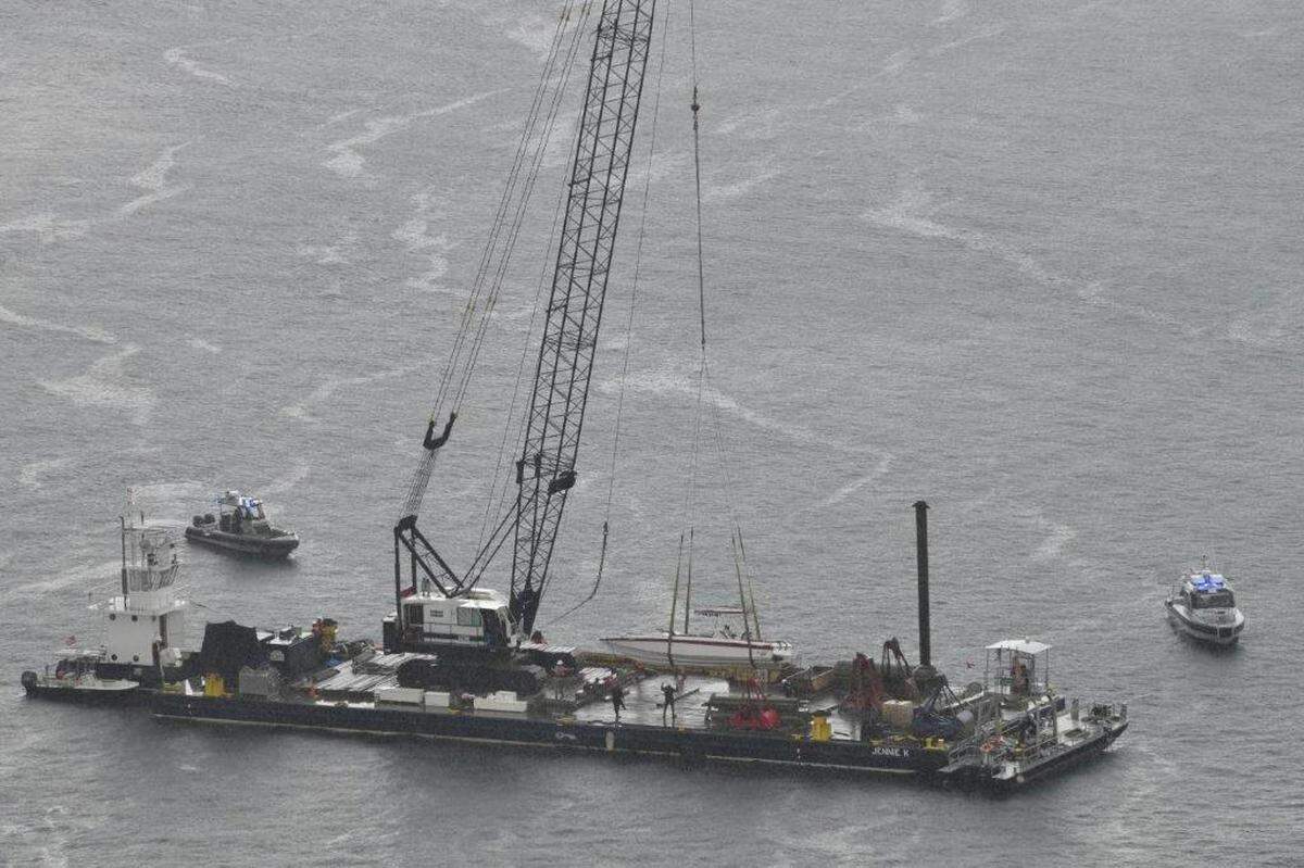 Crews recovered a sunken boat following a deadly boat crash with the Fisher Island ferry that killed one person on Sunday, June 25, 2023.