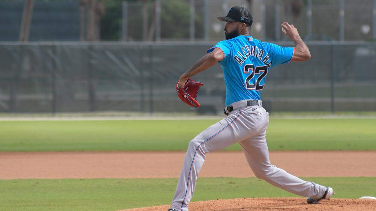Miami Marlins pitcher Sandy Alcantara throws a live batting practice session on Sunday, Feb. 19, 2023, on a back field at the Roger Dean Chevrolet Stadium complex in Jupiter, Florida.