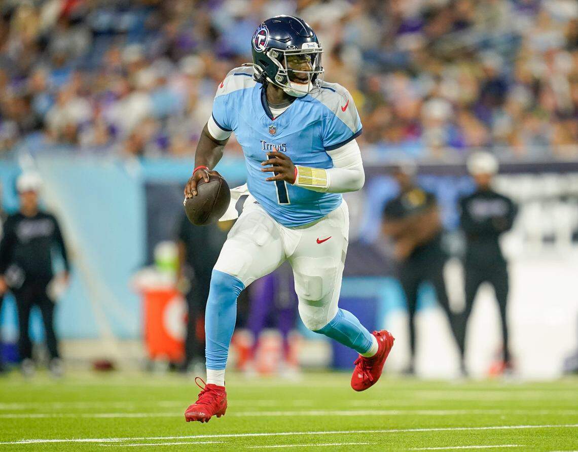 Tennessee Titans quarterback Cam Ward (1) runs the ball during the second quarter of an NFL pre-season game against the Minnesota Vikings at Nissan Stadium in Nashville, Tenn., Friday, Aug. 22, 2025.