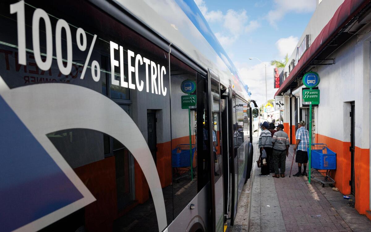 People get on an an electric bus on Tuesday, Feb. 11, 2025, heading north on the 77 route in Miami. Only five to seven of the Proterra electric (EV) buses are currently in service of the 69 that the county purchased because they are unable to be serviced since the company, Proterra, filed for bankruptcy.