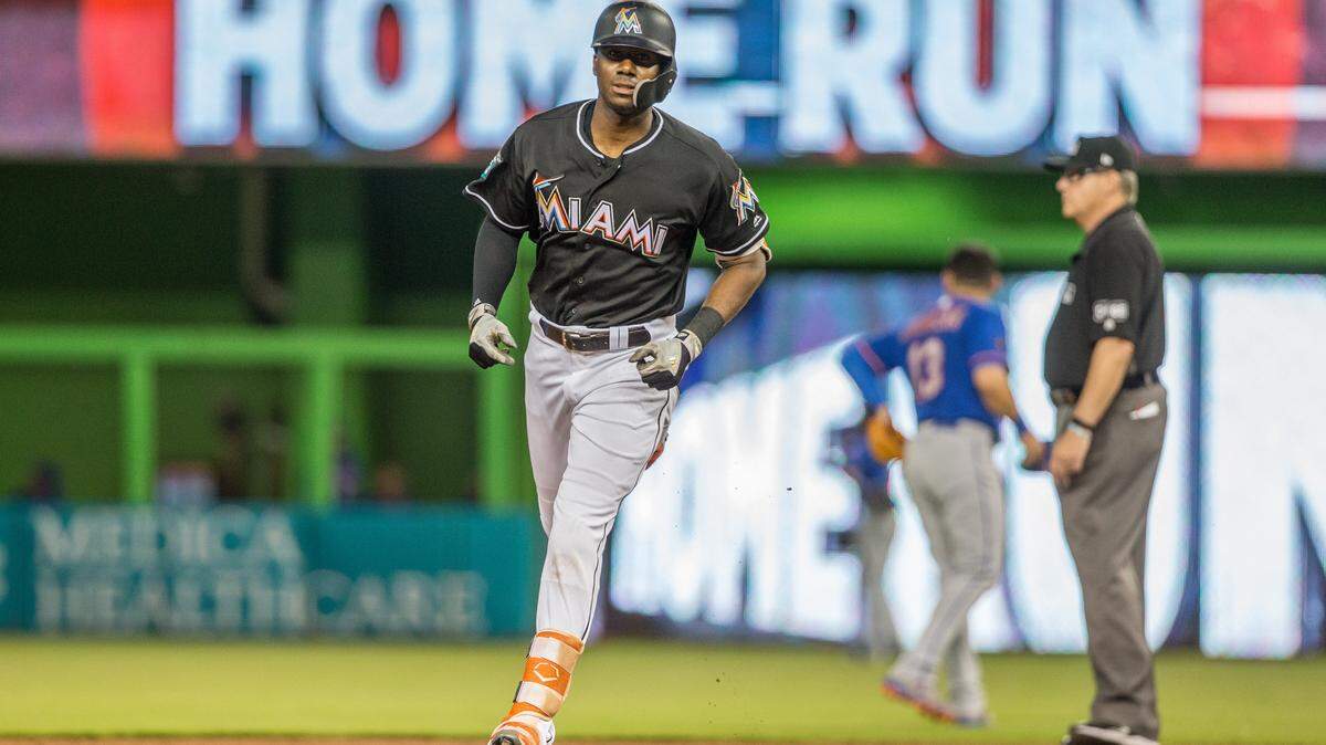 Miami Marlins center fielder Lewis Brinson (9) homers to left field during a game against the Mets on June 29. Brinson was hitting .184 when he went on the disabled list in early July; he’s expected back soon.