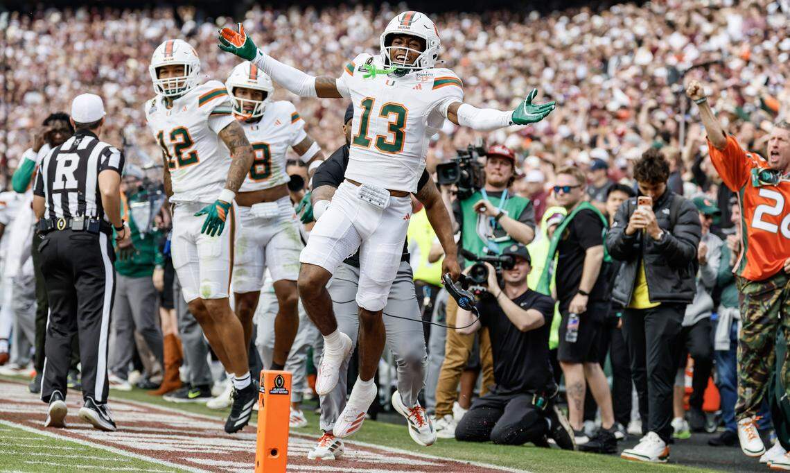 Miami Hurricanes defensive back Bryce Fitzgerald (13) celebrates after intercepting the ball in the second half against the Texas A&M Aggies of the first round of the 2025 College Football Playoff at Kyle Field at College Station, Texas, on Saturday, December 20, 2025.