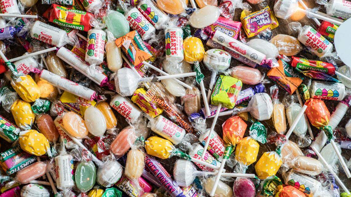 The 6-year-old was grabbing a candy bag left at the wrong house when the homeowner pulled a gun on him, police told news outlets.