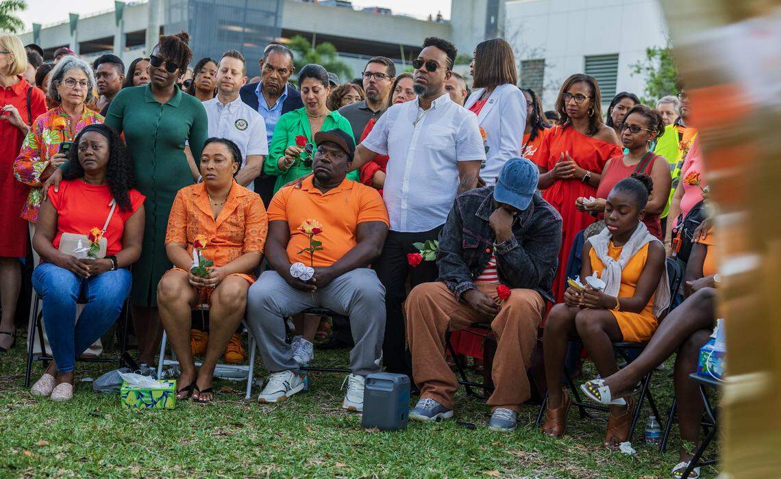 The family of Coral Springs Vice Mayor Nancy Metayer, seated in the front row, was embraced by a large group of community members and elected officials from across South Florida during a candlelight vigil celebrating her life.