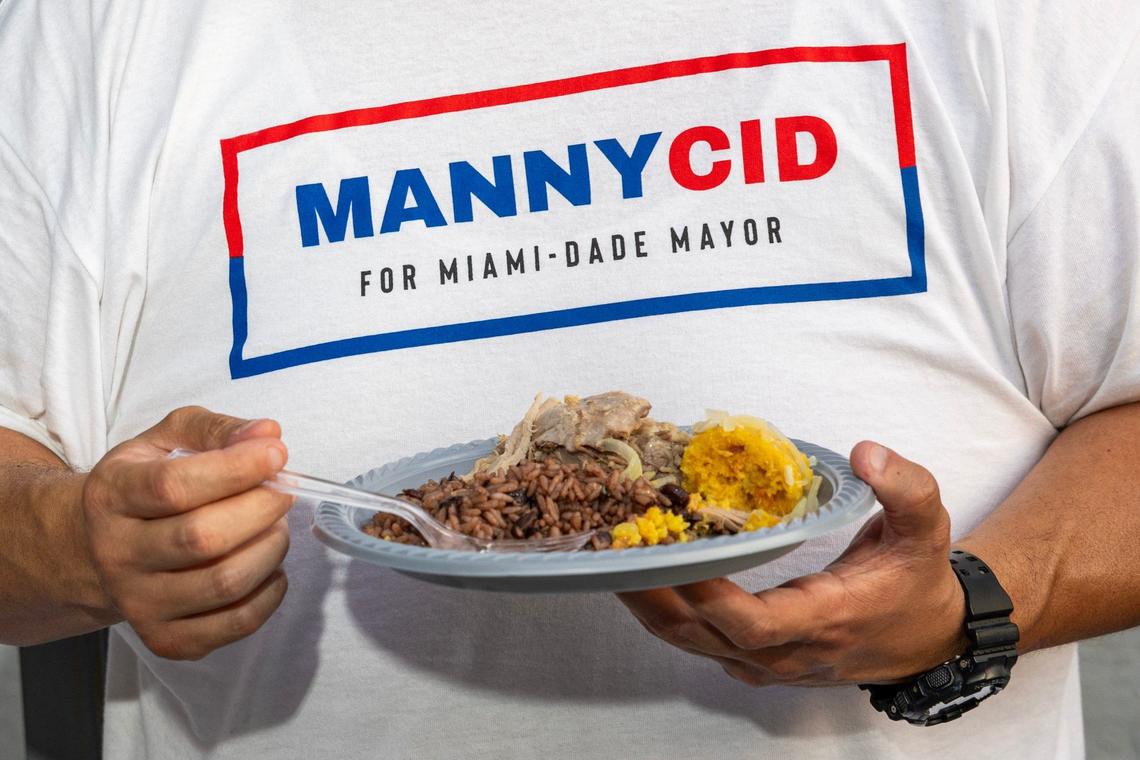Friends and family eat during the watch party for Miami-Dade County mayoral candidate Manny Cid on Tuesday, Aug. 20, 2024, in Miami Lakes, Florida.