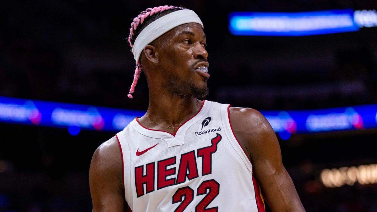 Miami Heat forward Jimmy Butler (22) reacts during the second half of an NBA game at Kaseya Center on January 1, 2025, in Miami.
