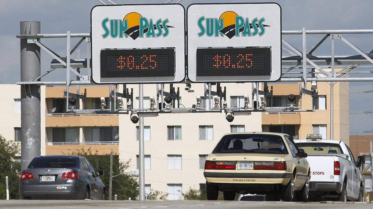SunPass sensors hang beneath the variable toll signs on the northbound I-95 Express lanes between I-195 and Northwest 61st Street.