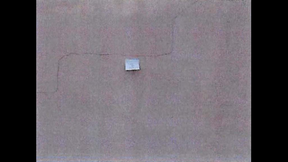 A photograph from a 2016 pre-construction survey by the Eighty Seven Park developers shows step-cracking in the southern privacy wall of Champlain Towers South.