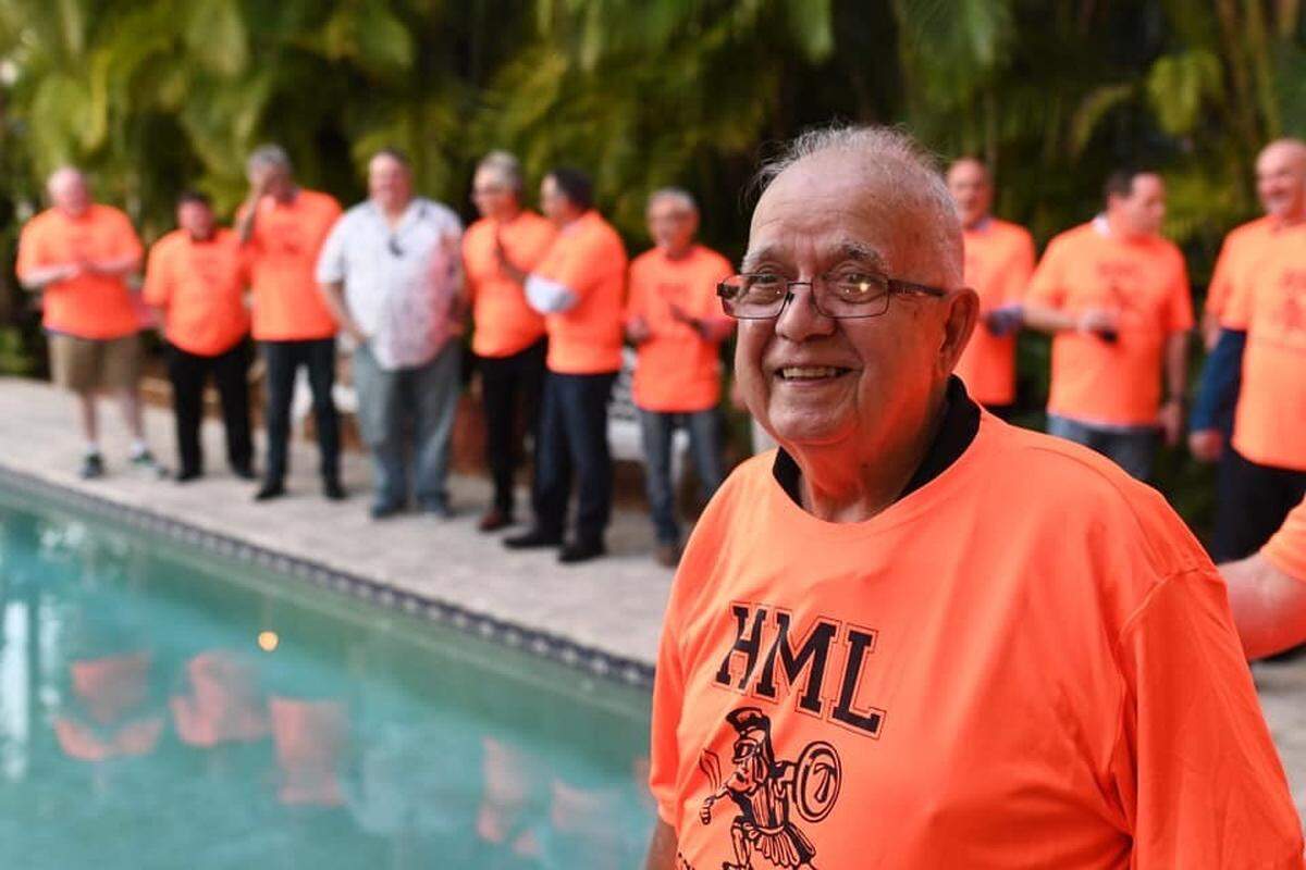 The 1977-78 Champion Hialeah-Miami Lakes Sr. High School soccer players line up for a picture in their reunion shirts in the same order as the original State Championship team picture. Their coach, Jose Enriquez, thanked them for the great memories.