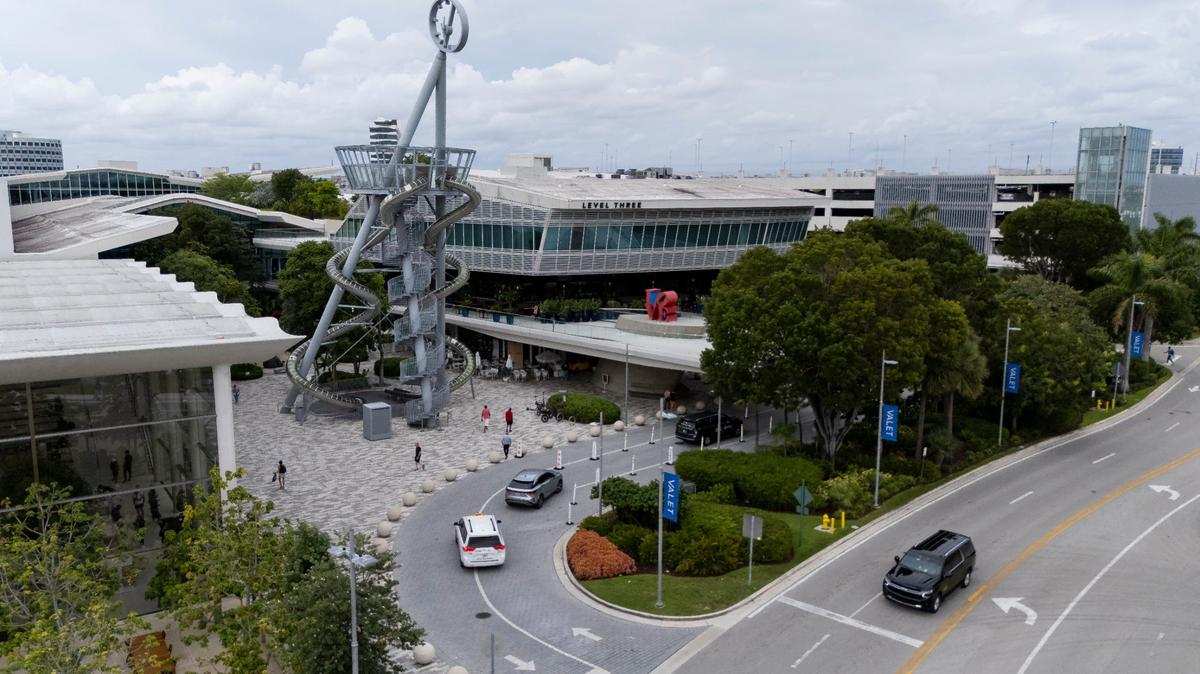 An aerial view of Carsten Höller’s 93-foot glass-and-steel slide, which welcomes visitors to Aventura Mall on Wednesday, Sept. 25, 2024, in Aventura, Fla. Malls are open on Columbus Day, Oct. 14, 2024.