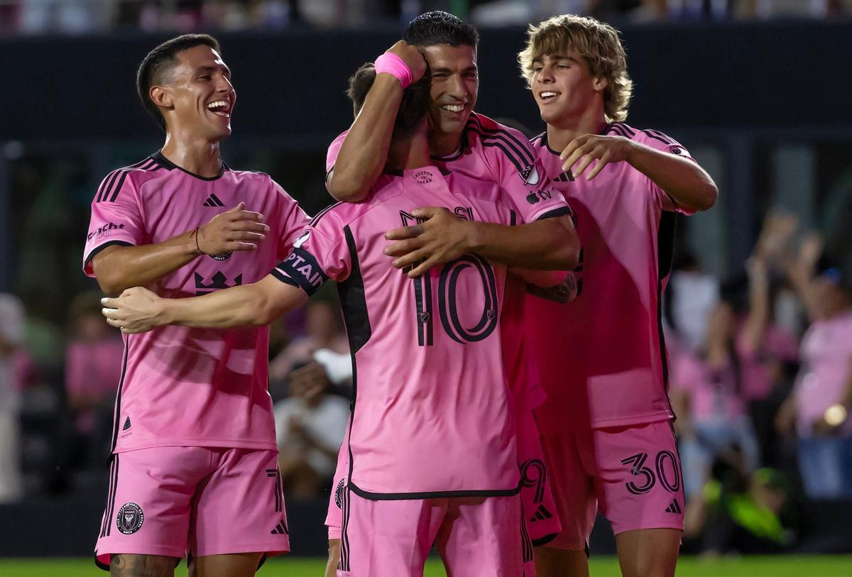 Inter Miami forward Luis Suárez (9) celebrates with teammates Lionel Messi (10) Benjamin Cremaschi (30) and Matias Rojas (7) after scoring a goal in the second half of their MLS match against the New York Red Bulls at Chase Stadium on Saturday, May 4, 2024, in Fort Lauderdale, Fla.