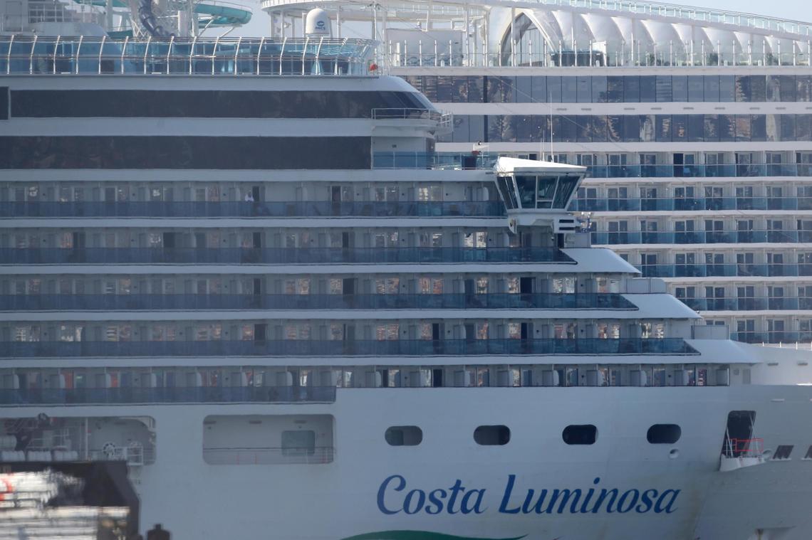 The trans-Atlantic cruise ship Costa Luminosa, which has recorded several cases of COVID-19 among its passengers, docks in the port of Marseille, southern France, Thursday, March 19, 2020.