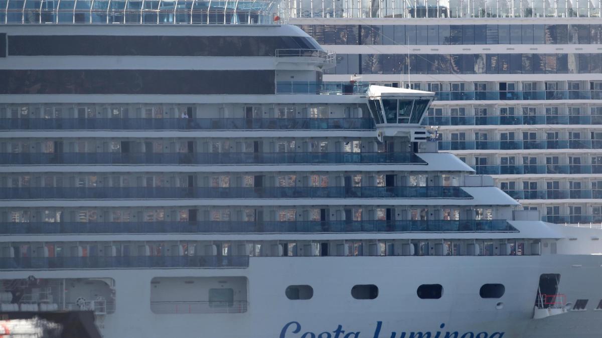 The trans-Atlantic cruise ship Costa Luminosa, which has recorded several cases of COVID-19 among its passengers, docks in the port of Marseille, southern France, Thursday, March 19, 2020.