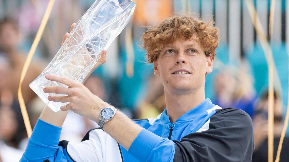 Jannik Sinner of Italy holds the Butch Buchholz trophy after defeating Grigor Dimitrov of Bulgaria in their men’s final match of the Miami Open tennis tournament at Hard Rock Stadium on March 31, 2024, in Miami Gardens, Fla.