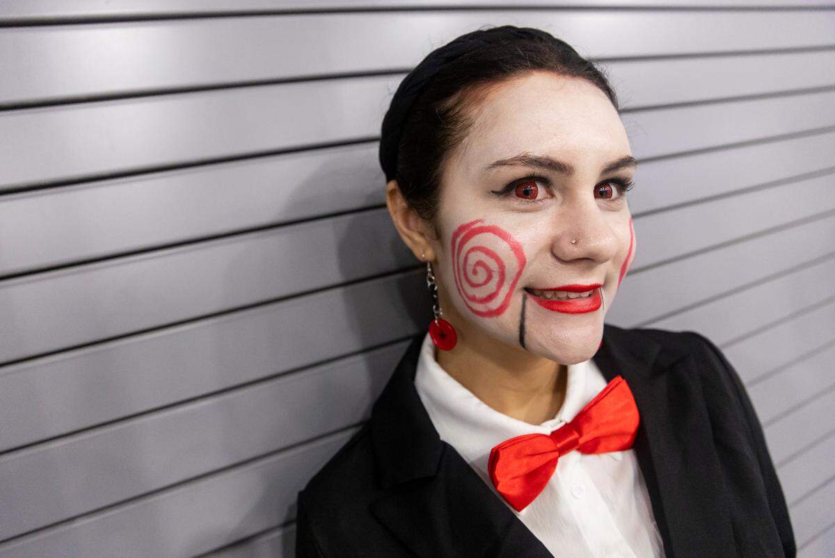 Sophia Ware, 18, cosplays as Billy the Puppet from Saw during Florida Supercon 2023 on Friday, June 30, 2023, in Miami Beach, Fla.