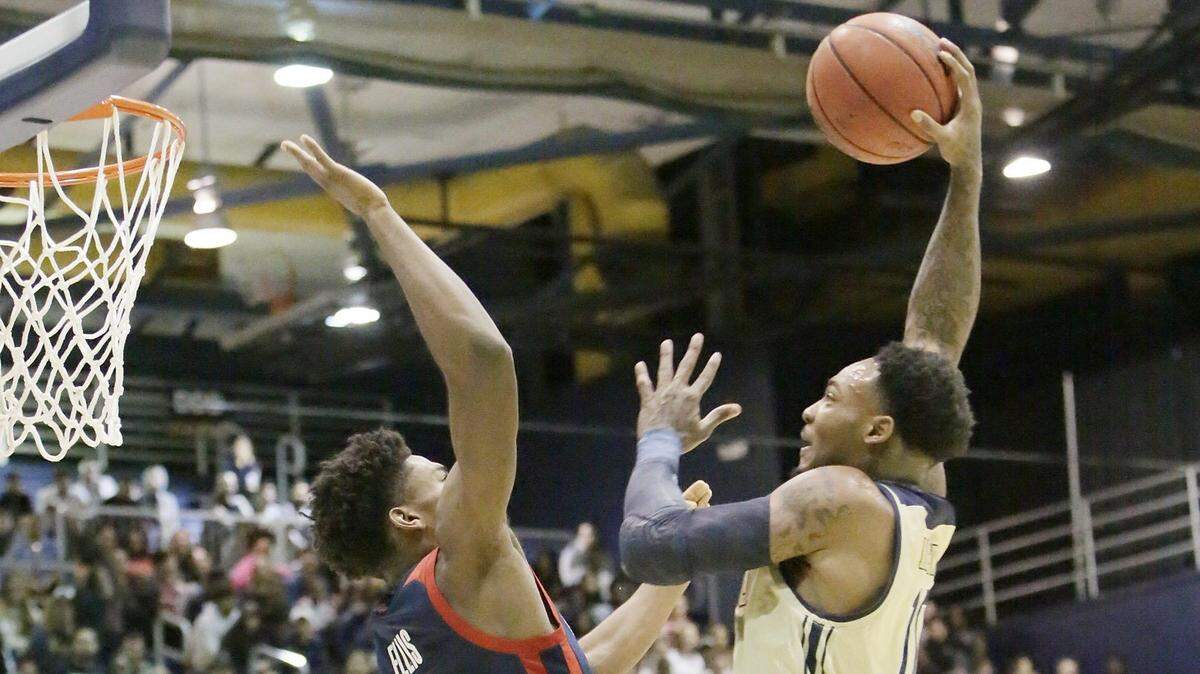 FIU Panthers’ Devon Andrews (10) goes for a shot against FAU Owls during the men’s basketball game on Saturday, Jan. 26, 2019 at FIU Ocean Bank Convocation Center in Miami.